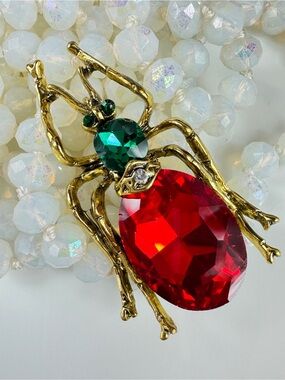 Vintage Gold-Tone Spider Brooch with Red and Emerald Green Crystals